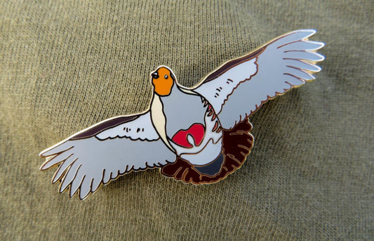 Get your new pin badge and help grey partridge conservation